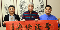 廣州美協主席周國城寶鷹集團揮毫傳遞圣誕祝福
